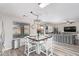 Kitchen dining area with a wooden table and white chairs at 11830 W Avenida Del Sol --, Sun City, AZ 85373