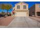 Two-story house with a large driveway and landscaped front yard at 11830 W Avenida Del Sol --, Sun City, AZ 85373