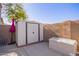 White storage shed and decorative storage bin at 11830 W Avenida Del Sol --, Sun City, AZ 85373