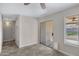 A light and bright hallway with sliding door access to the backyard at 1195 E Dust Devil Dr, San Tan Valley, AZ 85143