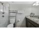 Updated bathroom with granite vanity and shower at 1211 N Miller Rd # 201, Scottsdale, AZ 85257