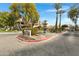 Community entrance with fountain and landscaping at 1211 N Miller Rd # 201, Scottsdale, AZ 85257