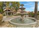 Ornate fountain and building exterior view at 1211 N Miller Rd # 201, Scottsdale, AZ 85257