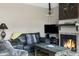 Cozy living room with fireplace and southwestern accents at 1211 N Miller Rd # 201, Scottsdale, AZ 85257