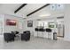 Bar area with seating and a view into the kitchen at 12210 N 76Th Pl, Scottsdale, AZ 85260