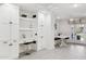 Kitchen nook with built-in white cabinets and a breakfast table at 12210 N 76Th Pl, Scottsdale, AZ 85260