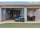 Covered patio with seating area and dining table at 12210 N 76Th Pl, Scottsdale, AZ 85260