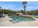 Inviting pool area with a waterfall and plenty of lounge space at 12210 N 76Th Pl, Scottsdale, AZ 85260