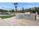 Outdoor kitchen and pool with artificial turf at 12210 N 76Th Pl, Scottsdale, AZ 85260