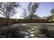 Landscaped backyard with gravel and stepping stones at 1229 E Prickly Pear St, Casa Grande, AZ 85122