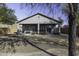 View of the home's back and the spacious backyard at 1229 E Prickly Pear St, Casa Grande, AZ 85122