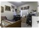 Guest bedroom with built-in desk and ample closet space at 1229 E Prickly Pear St, Casa Grande, AZ 85122