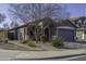 One-story house with gray exterior, attached garage, and landscaped yard at 1229 E Prickly Pear St, Casa Grande, AZ 85122