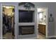 Main bathroom with double vanity and walk-in closet access at 1229 E Prickly Pear St, Casa Grande, AZ 85122