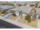 One-story house, gray roof, two-car garage, desert landscaping at 1238 W Silver Creek Ln, San Tan Valley, AZ 85140