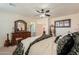 Bright bedroom with king-size bed and ensuite bathroom at 1238 W Silver Creek Ln, San Tan Valley, AZ 85140