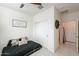 Bedroom with a daybed, built-in shelving and neutral decor at 1238 W Silver Creek Ln, San Tan Valley, AZ 85140