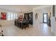 Formal dining room with a large wooden table and hutch at 1238 W Silver Creek Ln, San Tan Valley, AZ 85140