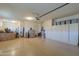 Spacious garage with overhead storage and flooring at 1238 W Silver Creek Ln, San Tan Valley, AZ 85140