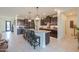 Modern kitchen with an island and dark cabinetry at 1238 W Silver Creek Ln, San Tan Valley, AZ 85140