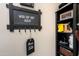 Laundry room with shelving and a chalkboard sign at 1238 W Silver Creek Ln, San Tan Valley, AZ 85140