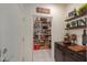 Walk-in pantry with ample shelving for food storage and organization at 1238 W Silver Creek Ln, San Tan Valley, AZ 85140