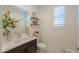 Charming powder room with decorative accents at 1238 W Silver Creek Ln, San Tan Valley, AZ 85140