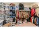 Spacious walk-in closet with custom shelving and drawers at 1238 W Silver Creek Ln, San Tan Valley, AZ 85140