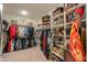 Large walk-in closet with ample shelving and hanging space at 1238 W Silver Creek Ln, San Tan Valley, AZ 85140