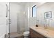 Bathroom with walk-in shower and wood vanity at 13238 E Ranch Gate Rd, Scottsdale, AZ 85255