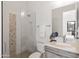 Modern bathroom with a walk-in shower and gray vanity at 13238 E Ranch Gate Rd, Scottsdale, AZ 85255