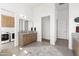 Modern bathroom with wood vanity and ample storage at 13238 E Ranch Gate Rd, Scottsdale, AZ 85255