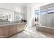 Elegant bathroom with dual vanities and a large shower at 13238 E Ranch Gate Rd, Scottsdale, AZ 85255