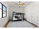 Bedroom with twin-over-twin bunk bed and ceiling fan at 13238 E Ranch Gate Rd, Scottsdale, AZ 85255