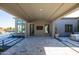 Spacious covered patio with flagstone flooring and seating area at 13238 E Ranch Gate Rd, Scottsdale, AZ 85255