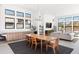 Modern dining room features a wood table and contemporary chandelier at 13238 E Ranch Gate Rd, Scottsdale, AZ 85255