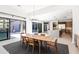 Bright dining room with sliding doors opening to a patio at 13238 E Ranch Gate Rd, Scottsdale, AZ 85255