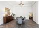 Elegant dining room with dark wood table and gray chairs at 13238 E Ranch Gate Rd, Scottsdale, AZ 85255