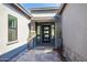 Elegant entryway with modern door and stone accents at 13238 E Ranch Gate Rd, Scottsdale, AZ 85255