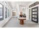 Bright and spacious entryway with modern chandelier and tile floors at 13238 E Ranch Gate Rd, Scottsdale, AZ 85255