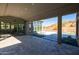 Covered patio overlooking the pool and backyard at 13238 E Ranch Gate Rd, Scottsdale, AZ 85255