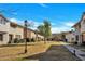 Neatly landscaped community with walkways and several townhomes visible at 1387 N 44Th St, Phoenix, AZ 85008