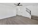 Bright and airy living room with laminate flooring and a staircase at 1387 N 44Th St, Phoenix, AZ 85008