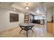 Charming dining area with a round table and view into the kitchen at 14228 N Yerba Buena Way, Fountain Hills, AZ 85268