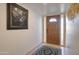 Interior entryway with wood door and rug at 14228 N Yerba Buena Way, Fountain Hills, AZ 85268