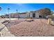 House exterior with a rock garden and a real estate sign at 14228 N Yerba Buena Way, Fountain Hills, AZ 85268