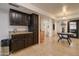 Dark wood cabinetry and granite countertops highlight this kitchen at 14228 N Yerba Buena Way, Fountain Hills, AZ 85268