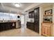 Well-equipped kitchen boasting dark wood cabinets and granite countertops at 14228 N Yerba Buena Way, Fountain Hills, AZ 85268