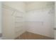 Walk-in closet with wire shelving for storage at 14422 W Via Tercero --, Sun City West, AZ 85375