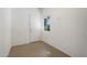 Laundry room with built in cabinets and window at 14422 W Via Tercero --, Sun City West, AZ 85375